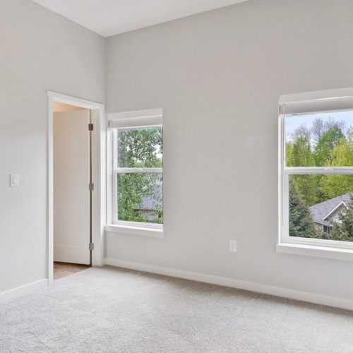 corner of bedroom with window